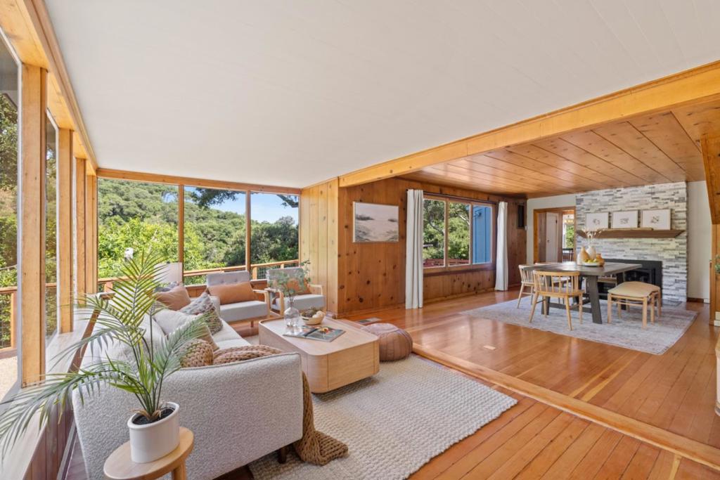 A true Carmel Valley treasure. Welcome to a home filled with warmth, history, and timeless charm. Located in one of the areas most sought-after neighborhoods and available for the first time in more than seven decades, this 1930's gem has been lovingly cared for and is brimming with character. It features a spacious eat-in kitchen connected to a cozy family/dining area with a bright, inviting sunroom. A versatile downstairs office or bedroom offers flexible living options to suit your lifestyle. Upstairs, you'll find four bedrooms, including a primary suite that opens to a delightful balcony. A charming gas fireplace in the living room creates a warm, welcoming ambiance year-round. The sunny yard is ideal for entertaining, gardening or a play area for children. With mountain views from nearly every room, you'll feel connected to nature. Located within the coveted Carmel Unified School District, only a mile from the Carmel Valley Village, this home offers the perfect balance of peaceful retreat and close-to-town convenience with shopping, fine dining, and wine tasting just minutes away. This is more than just a house, it's a legacy waiting for its next chapter. Come experience the magic and imagine making your own cherished memories in this one-of-a-kind property.