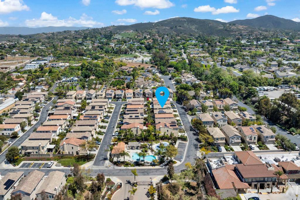 How would you like to save HUNDREDS of dollars a month and possibly THOUSANDS every year on Electric bills? You will LOVE this meticulously maintained home, complete with OWNED TESLA SOLAR PANELS + a TESLA POWER WALL! This is one of the most beautiful and affordable homes in all of North County! So much to love here, and at barely ten years old, this is the perfect first home! You'll love the stunning neutral decor as well as the amount of natural light pouring into every room! With a wonderful open layout on the first floor that includes a spacious living/family/great room, a warm and cozy fireplace, and of course a beautiful dining room too! The kitchen will be one of your favorite places, not only to cook in, but for entertaining as well! With plenty of cabinet space, granite countertops, a big center island and stainless steel appliances! The primary suite has it's own private bath with dual vanities, a walk in shower and of course a well organized walk-in closet! Three more generously sized bedrooms and a large 2nd floor laundry room complete the second floor! Busy families will love that the exterior and yards are virtually maintenance free! The fully fenced backyard features a big concrete patio, built in fire pit, artificial turf and raised flower beds! Nothing to do in front as the HOA maintains that for you! In addition to the owned solar panels, other energy saving features include a tankless hot water heater and smart thermostat! Serra is a super friendly gated community that features a sparkling pool, playground, clubhouse with outdoor dining/BBQ areas, and yes it's very pet friendly with doggie runs and doggie stations on almost every street! Located in the heart of Vista, close to freeways, schools, and all of the newly added entertainment, dining and shopping venues! VA & FHA approved! Welcome to your new home!