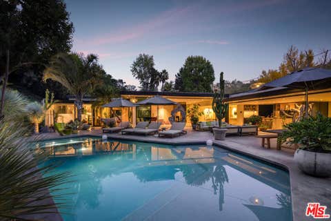 Photo of 1087 Moraga Drive, Los Angeles, CA 90049 (MLS # 26859099)