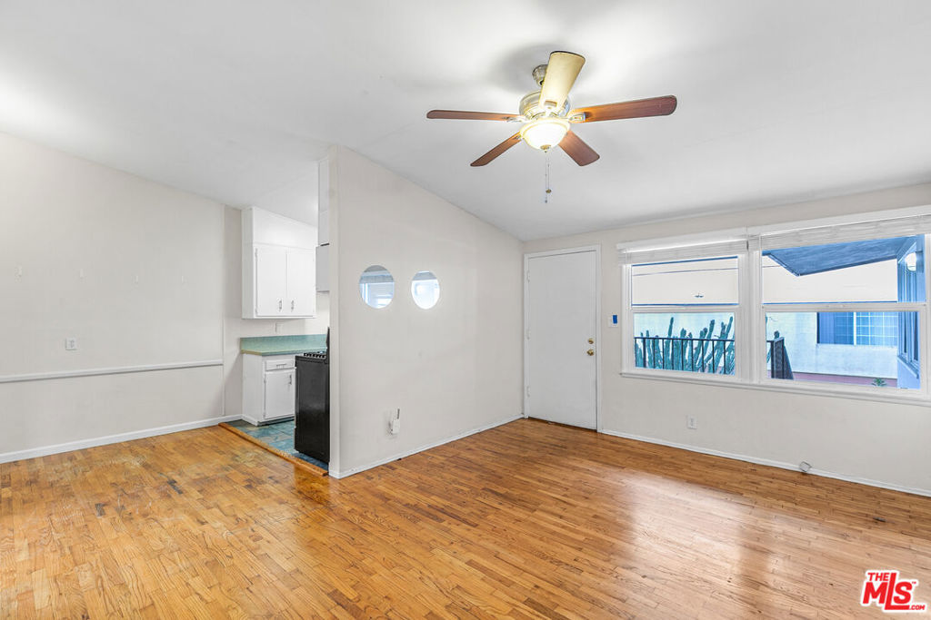 If you've been holding out for that just right spot on the Westsidesomething bright, breezy, and close to everything Mar Vista this is your sign. This updated one-bedroom, one-bath gem sits on the top floor of a well-maintained building and checks all the boxes: natural light, great layout, and a killer location. Step inside and take in those airy vaulted ceilings and warm wood floorsclassic Mar Vista charm with a modern touch. The living space flows easily into a crisp white kitchen, where stainless steel appliances (including a gas stove and full-size fridge) keep things clean and functional without feeling cramped. The bedroom is a total vibe, complete with a ceiling fan and plenty of light. The bathroom has everything you need, and the overall layout makes great use of the space without sacrificing comfort. Whether you're working from home, heading out to the beach, or just enjoying a slow morning with your coffee, this spot feels like home. Pets are welcome here, and parking is available for just $50/month if you'd rather skip the hunt for a street spot. This one's the full Mar Vista packageupgraded, well-located, and ready for move-in. Come see it for yourself before someone else grabs it first.