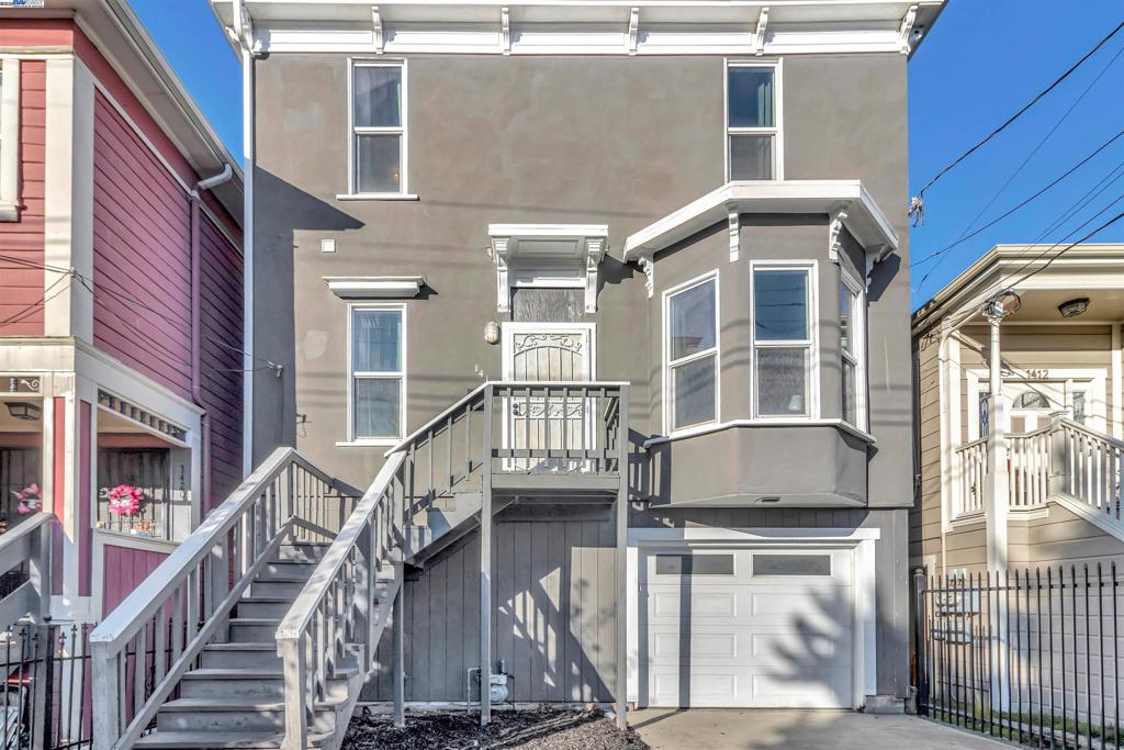 This distinctive Oakland tri-level combines vintage character with thoughtful modern updates, offering approximately 1,372 sq. ft. of finished living space plus the opportunity for a second living unit below, creating flexibility for an ADU, guest suite, or workspace—which, with the addition, could bring the home to a generous 2,235 sq. ft. Situated on a 3,080 sq. ft. lot in the vibrant East Bay, the home dates back to 1893 and retains its historic roots while showcasing improvements such as skylights, hardwood floors, new carpeting, updated lighting, and fresh paint. The primary living level (on the second floor) opens to a spacious front room with lofty ceilings and a dramatic bay window. An airy kitchen and dining area—both illuminated by skylights—feature granite counters, a full-height mosaic backsplash, and stainless steel appliances. This floor also includes three bedrooms, two full bathrooms and laundry with LG washer/dryer. Upstairs, a graceful banister leads to primary bedroom and additional bedroom/office filled with natural light, ideal for guests or a home office. The lower level offers a blank canvas for an ADU. Located in West Oakland, just five blocks from BART with easy freeway access. Large back yard. Floor plan in photos.