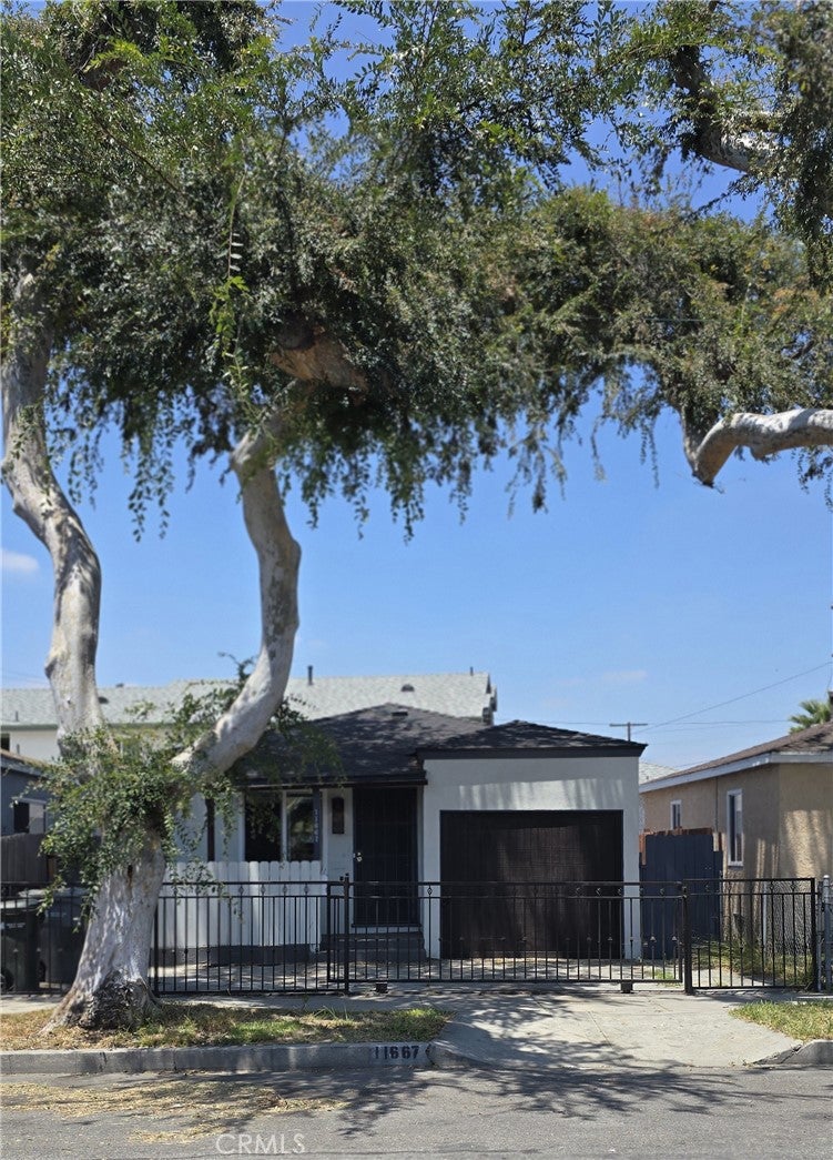 Photo of 11667 Elm ST, Lynwood, CA 90262 (MLS # DW26150254)