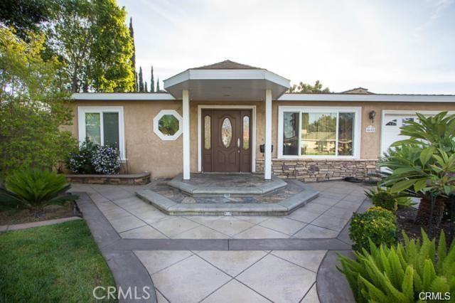 Beautiful House, Great area of Covina located on a cul-de-sac. Custom stamped, colored concrete patterns, and brick inlays featuring slate stepping stone all with custom lighting. Impeccably remodeled Kitchen offers new cabinet, granite counters and fixtures with high end finishes example, pull out shelves, Lazy Suzanne and plenty of room in cabinets. Kitchen opens up to a spacious family room with lots of natural light and finished with pre-wiring for surround sound. The two bedrooms are good size with custom closet organizers. Gorgeous Master room is located in the rear of this home with its own Master Bathroom. Sliding door off Master leads to the beautiful landscaped yard which offers avocado and plenty of room for entertaining. POTENTIAL TO BUILD ADU.