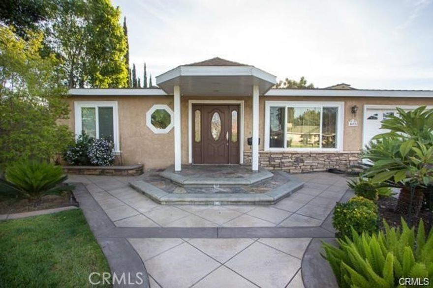 Beautiful House, Great area of Covina located on a cul-de-sac. Custom stamped, colored concrete patterns, and brick inlays featuring slate stepping stone all with custom lighting. Impeccably remodeled Kitchen offers new cabinet, granite counters and fixtures with high end finishes example, pull out shelves, Lazy Suzanne and plenty of room in cabinets. Kitchen opens up to a spacious family room with lots of natural light and finished with pre-wiring for surround sound. The two bedrooms are good size with custom closet organizers. Gorgeous Master room is located in the rear of this home with its own Master Bathroom. Sliding door off Master leads to the beautiful landscaped yard which offers avocado and plenty of room for entertaining. POTENTIAL TO BUILD ADU.