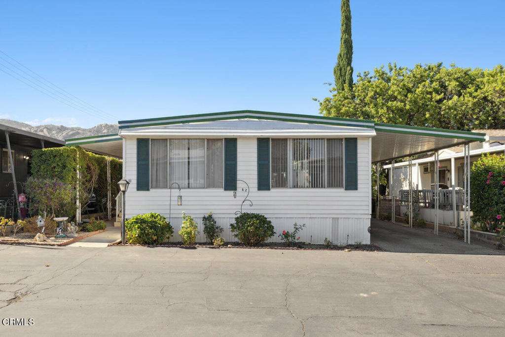 Welcome to this beautifully maintained 3-bedroom, 2-bath manufactured home nestled in the heart of scenic Simi Valley. Freshly painted and full of charm, this cozy home offers a welcoming atmosphere from the moment you step inside. Natural light fills the open living space, highlighting the clean finishes and thoughtful layout designed for both comfort and functionality.Each bedroom is well-sized, with the primary suite featuring a private bath for added convenience. The kitchen flows effortlessly into the dining and living areas, creating a perfect space for everyday living or entertaining.Outside, enjoy the peaceful ambiance of the surrounding Simi Valley hills, offering a serene backdrop and a true sense of retreat. Located in a well-kept community, residents have access to two large pools, a spa, RV parking available (available at an a additional cost), a clubhouse and recreation room. Local park amenities including green spaces, walking paths, and recreational areas--ideal for relaxing or staying active.Whether you're looking for your first home, a downsize opportunity, or simply a quiet escape with easy access to all that Simi Valley has to offer, this lovingly cared-for home is move-in ready and waiting for you