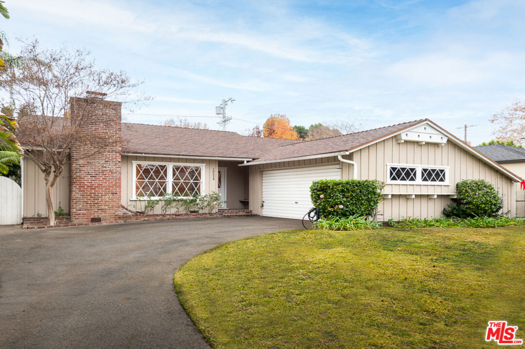 Welcome to this gorgeous 2 bed/1 bath single-family home right in the heart of Toluca Lake. Step into the inviting living room with well-maintained hardwood floors and impressive stone fireplace. Just off the living room is a bright and airy sunroom, that looks out to the backyard. The kitchen is well appointed with granite countertops, washer, dryer, fridge/freezer, stove and microwave. The primary and second bedrooms are sizeable with built-in wardrobes and plenty of space for a California king bed. The well-maintained bathroom offers a free-standing enclosed shower, vanity and additional bath/shower combo. Outside, the yard is a lovely, private space; perfect for outside dining and spending time with family & friends. Other conveniences include a large 2-car detached garage, central A/C and forced-air heating. Enjoy this stunning home and everything Toluca Lake has to offer; close to excellent restaurants & entertainment on Riverside Dr and just a short drive from Warner Brothers Studios, Universal Studios, Netflix & more. This really is a wonderful home.