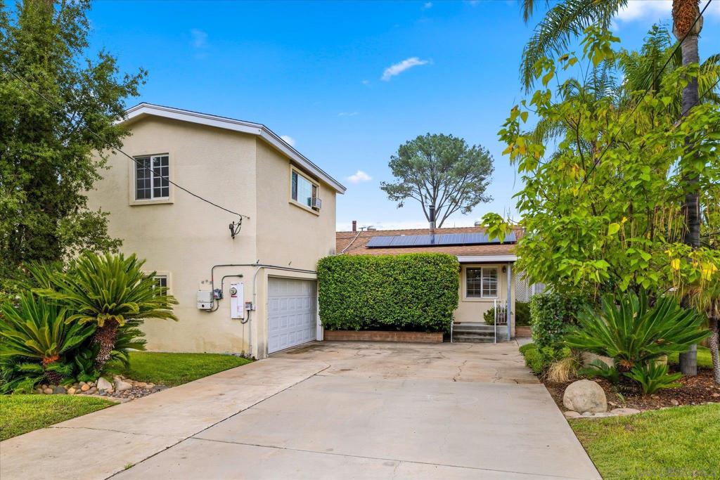 Welcome to this charming 4 bedroom, 2 bathroom, 1,569 SqFt home tucked away on a quiet street in Lakeside. Set back from the road with a long private driveway, this property offers both privacy and convenience. The home features solar panels, helping keep energy costs low, and a 2 car garage for plenty of storage and parking. Step outside to your own backyard oasis with a sparkling pool and a spacious yard, perfect for entertaining, relaxing, or enjoying the sunny California lifestyle. With so much to offer, this home combines comfort, functionality, and outdoor living all in one!