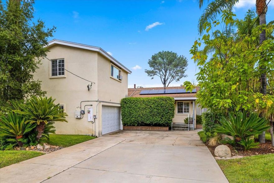 Welcome to this charming 4 bedroom, 2 bathroom, 1,569 SqFt home tucked away on a quiet street in Lakeside. Set back from the road with a long private driveway, this property offers both privacy and convenience. The home features solar panels, helping keep energy costs low, and a 2 car garage for plenty of storage and parking. Step outside to your own backyard oasis with a sparkling pool and a spacious yard, perfect for entertaining, relaxing, or enjoying the sunny California lifestyle. With so much to offer, this home combines comfort, functionality, and outdoor living all in one!