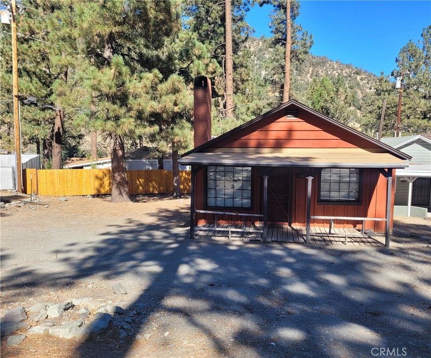 Bring your tools and paint brush to make this your delightful mountain cabin. Great location next to town to enjoy all that Wrightwood has to offer.  

2 bdrms and 1 full bath.  Living room with has wood walls and wood burning fireplace. Kitchen with gas range/oven and new water heater installed May 2025.  Fix up front porch and rear deck to utilize your outdoor space.  Cabin is built on 2500 sq ft lot.  Asking price includes APN# 0355-173-24-0000; 4625 sq ft vacant lot next door.  Total sq ft of (2) lots = 7135 sq ft making plenty of room for parking, more entertaining space or ... Offered at a great investment price of  $275000.00. CASH ONLY, AS-IS.