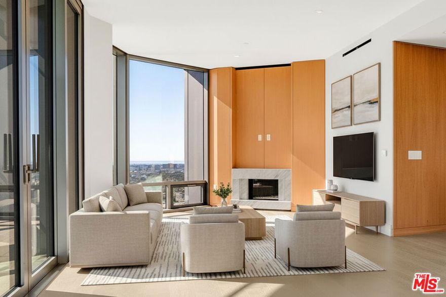 Experience elevated Westside living in Residence 16B at the prestigious Century Plaza Park Elm, showcasing sweeping city skylines and glimmering ocean views through dramatic 10-ft tall floor-to-ceiling windows. This refined 2-bedroom, 2.5-bath home features an open layout, a modern chef's kitchen, and a private terrace perfectly positioned to take in sunsets over the Pacific. The Snaidero-designed kitchen is equipped with Miele appliances and a custom slab waterfall island, blending sleek design with exceptional functionality. Both bedrooms include en-suite baths and generous closet space. Residents enjoy world-class amenities including a resort-style pool, state-of-the-art fitness center, steam-equipped locker rooms, screening room, library, game room, personal wine storage, private dining rooms, guard-gated entry, and 24-hour concierge service. A sophisticated high-rise lifestyle minutes from Beverly Hills and Century City's best. Virtual tour: https://my.matterport.com/show/?m=1T8oWrg7D2E. Virtual staging used.