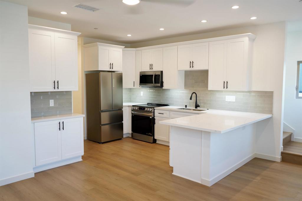 Brand NEW LUXURY build in Pacific Beach. Be the 1ST to live in this gorgeous NEW 3 bedroom townhome just blocks from the water. This home features high end finishes throughout including : pristine wood flooring , Italian marble shower surrounds, modern fixtures, ample lighting, high ceilings, ALL new appliances including full size upgraded front loading stackable washer/dryer inside, large open rooms, lots of storage, and an exclusive approx. 400sf roof deck with views to the water, city, fireworks and beyond. Also incudes solar to bring your utility bill down, water is paid for, and 1 private garage space + alley spot. Don't miss this opportunity.