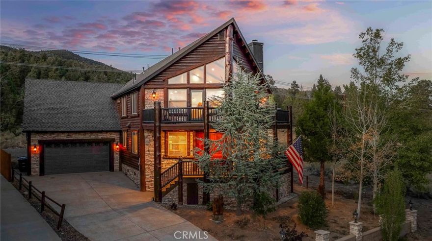 Nestled in the upscale Bear Loop neighborhood, this stunning mountain chalet offers breathtaking views of the grand ski slope from its balcony and primary suite/penthouse. The primary suite boasts its own full kitchen, fireplace, spacious bathroom with a jetted tub, large steam shower, and private patio. This home is perfect for entertaining, with its expansive great room and open kitchen/dining area creating an ideal setting for friends, loved ones, or even your own private mountain retreat. The downstairs primary suite features its own fireplace, exquisitely designed bathroom, and an outside patio with an 8-person spa with panoramic views of the surrounding mountain terrain. For those who prefer electric vehicles, the home is equipped with an electric car charging station, 220V wall connector. Numerous smart home upgrades have been made, including Wi-Fi smart lighting and climate control. Each bedroom, has private access so it can be individually rented or used in its entirety. Most of the homes furniture and appliances are included. This gem in the mountains stands as a remarkable testament to luxury mountain living and is within 4 miles of Snow Summit and the Big Bear Mountain Ski Resort. Your lifetime memories are here for you to cherish.