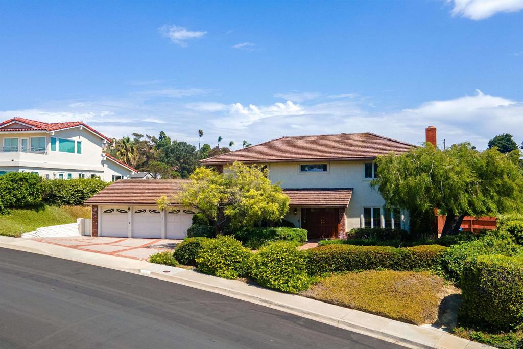 Welcome to 5353 Westknoll Drive, a rare opportunity in the sought-after Castle Hills neighborhood of Pacific Beach. Situated on the west side of Soledad Mountain, this expansive 4-bedroom, 2.5-bath residence offers nearly 3,000 square feet of living space on an elevated and private lot along a quiet street of established hillside homes. On the market for the first time in over 50 years, the home has been meticulously cared for and presents a truly special chance to make it your own. Designed with a traditional floor plan, the home features large living areas, generous bedrooms, and multiple gathering spaces providing ample room for family, entertaining, and a comfortable coastal lifestyle. Modern amenities include paid-off solar energy and a home security system, offering both efficiency and peace of mind. A massive 3-car garage provides exceptional parking, storage, and flexibility that is rarely found in this neighborhood. Outdoors, enjoy pristine and picturesque landscaping, private spaces for relaxing or entertaining, and serene hillside views, along with ocean views from the second level.