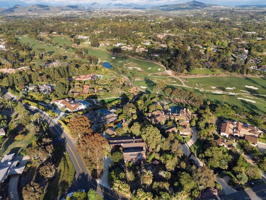 Offering a wide array of possibilities, this expansive home is a short walk to the Village, Roger Rowe School, golf course, tennis courts, and clubhouse. This property hosts three distinct structures: a 4-bed, 4-bath home (built in 1952, remodeled in 1976); a 4-bed, 4-bath structure (built in the early 1990s) is connected via a breezeway, and a separate ~900 sq ft 1-bed, 1-bath guest house adjacent to the swimming pool. Resting amidst 1.3 acres the opportunities are varied - from restoring the original home to further expansion and remodeling of the multifamily-ready site to fully capture the landscape in this perfect Rancho Santa Fe Covenant setting.