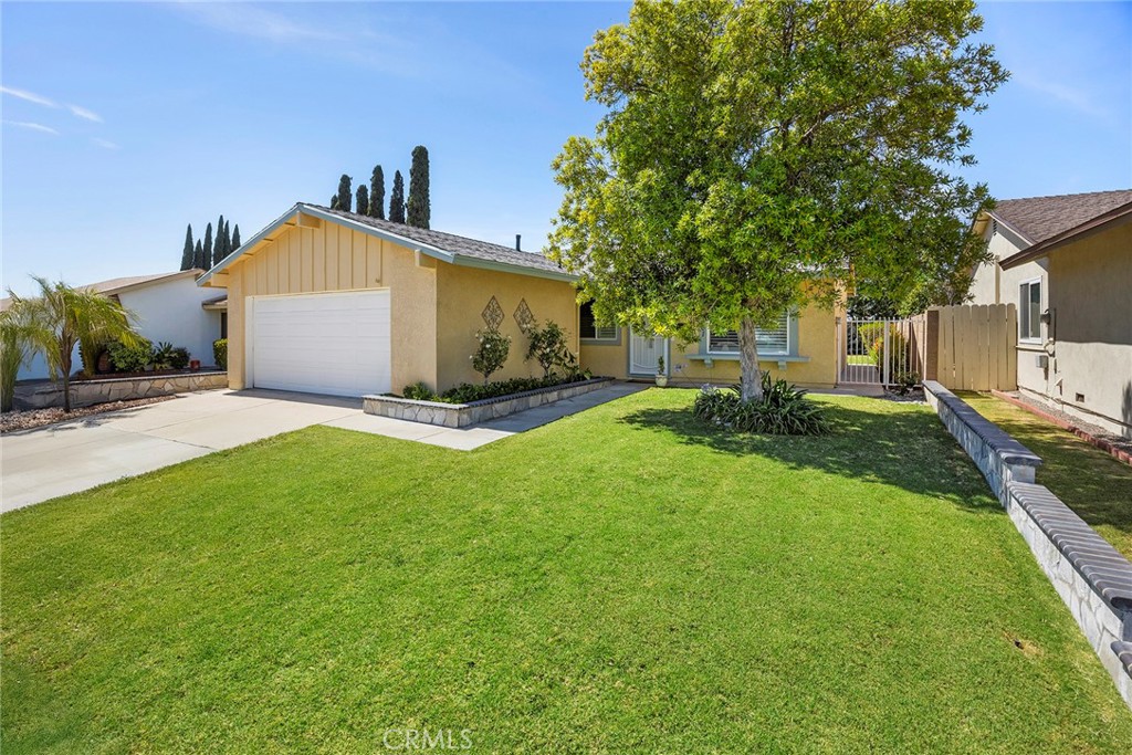 Welcome home! This charming hoome is move in ready for you! Located a few short blocks from the Santa Ana River Trail Bikeway and in close proximity to many shops, restaurants and convenient access to 91, 55 and 57 FWYS. No steps. One story with 2 car attached garage.
This home was loved for many years by a wonderful family. Enjoy all the upgrades including new paint, Laminate flooring throughout, double pane windows, recessed lights, bright remodeled kitchen with beautiful kitchen cabinets, tile flooring and stainless steel appliances. Spacious living room with wooden shutters and recessed lights. Remodeled bathrooms with tile flooring. Master bedroom with walk-in closet and in-suite walk-in bathroom. The back yard is beautiful and private. Don’t miss the opportunity to make this your forever home free of HOA fees or Mello-Roos tax.