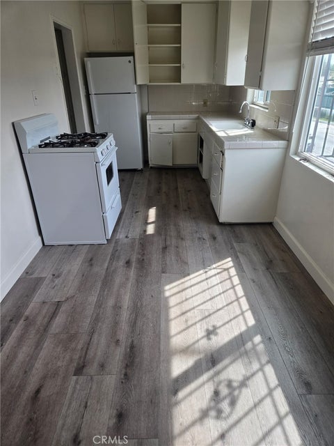 Photo of 5908 1/2 Crenshaw BLVD, Los Angeles, CA 90043 (MLS # RS26197740)