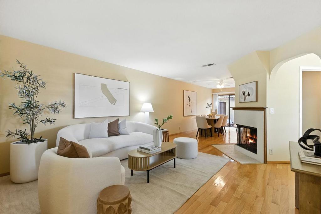 Discover a Great Opportunity in the Heart of Santa Clara! This 2-level, end-unit townhome is move-in ready and tucked inside a secure, gated community of just 11 homes. The main level features an open-concept living and dining area, a convenient half bath, large storage closet, a full kitchen with a functional layout, and direct access to your own private yard that connects to your detached 2-car side-by-side garage. Upstairs, you'll find two spacious bedrooms with ample closet and storage space, a full bathroom with a skylight that brings in natural light, and a convenient laundry area for added ease. The community includes a sparkling pool and BBQ area, offering a great space to relax or entertain. Ideally located within walking distance to Santa Clara Town Centre - with Target, Sprouts, and a wide variety of shops and restaurants - and just minutes from Santana Row, Westfield Valley Fair, Apple Park, Nvidia and San Jose Airport. Don't miss your chance to own this centrally located Santa Clara gem!