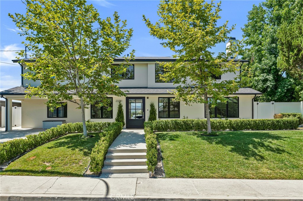 Modern Masterpiece in Prime Woodland Hills! Welcome to this stunning 5 bedroom 4 bathroom new construction home with Gorgeous SUNSETS, Home and Pool SOLAR and EV Charger that delivers the ultimate wow factor—from the dramatic entry with sweeping mountain views to the curated designer finishes found throughout. This cutting-edge modern farmhouse blends architectural sophistication with everyday comfort, offering the best of California living. Step inside to discover beautiful wide-plank wood floors, custom lighting, and an expansive open floor plan designed for seamless entertaining. The chef’s kitchen is a showstopper, featuring quartz countertops, a waterfall island, and top-of-the-line stainless steel appliances—all opening to the dining area, living room, and family room. Every surface has been thoughtfully crafted with high-end, custom touches. Upstairs, the expansive primary suite is a true retreat, showcasing stunning mountain views, walk-in closet and a spa-like ensuite bath with a freestanding soaking tub, oversized shower, and dual vanities. A second bedroom features its own private ensuite bath, while two additional bedrooms share a beautifully appointed bathroom—ideal for families or guests. Downstairs boasts a private interior ADU with its own entrance provides flexible space for guests, extended family, or a studio. Step outside to enjoy the resort-style backyard complete with a saltwater pool, Citrus, Grapefruit and Orange trees, outdoor fireplace, and ideal indoor-outdoor flow for entertaining year-round. Located in a highly sought-after Woodland Hills cul-de-sac neighborhood, you'll enjoy quick access to the 101 freeway, scenic hiking trails, Malibu beaches, and top-rated schools including El Camino Charter High, Hale Charter Middle, and Woodlake Elementary. Just minutes to Warner Center, The Village, and premier shopping and dining. This is A one-of-a-kind opportunity to lease a true showpiece in Woodland Hills.