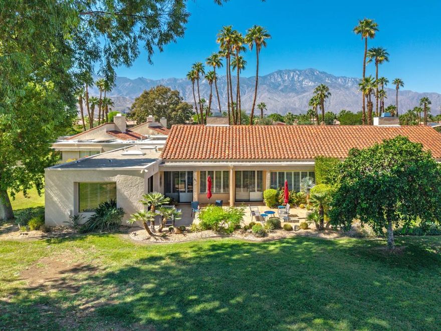 NEW ACs and LAND LEASE HAS BEEN EXTENDED: 2121!!!Tastefully remodeled and thoughtfully upgraded, this elegant 3-bedroom, 3-bath home in Mission Hills Country Club offers a refined blend of modern design and timeless comfort. Positioned on the 8th green of the Tournament Course, the property takes full advantage of its golf course frontage with expansive views of the fairway and surrounding mountains. Inside, dark bamboo flooring runs throughout the open-concept layout, complementing a custom kitchen with white cabinetry,  quartz countertops, modern appliances, and a built-in wet bar with a wine fridge. The living and dining areas are bright and spacious, enhanced by custom lighting and clean, modern finishes. Two of the three bedrooms feature en-suite baths with marble or tile showers, elevated vanities, and designed fixtures. The third bedroom includes built-in cabinetry and a Murphy bed, offering flexible use for guests or a home office. Generous windows and sliders bring in natural light, while plantation shutters add privacy and style. A private patio provides direct access to the greenbelt and golf course, with low-maintenance desert landscaping completing the outdoor space. The home includes NEW ACs and an attached 2-car garage and sits within a gated community offering access to pools, tennis, fitness facilities, and clubhouse amenities. HOA covers landscaping, exterior maintenance, insurance, and more. Land lease through 2121. A polished and private desert retreat in a prestigious Rancho Mirage location.