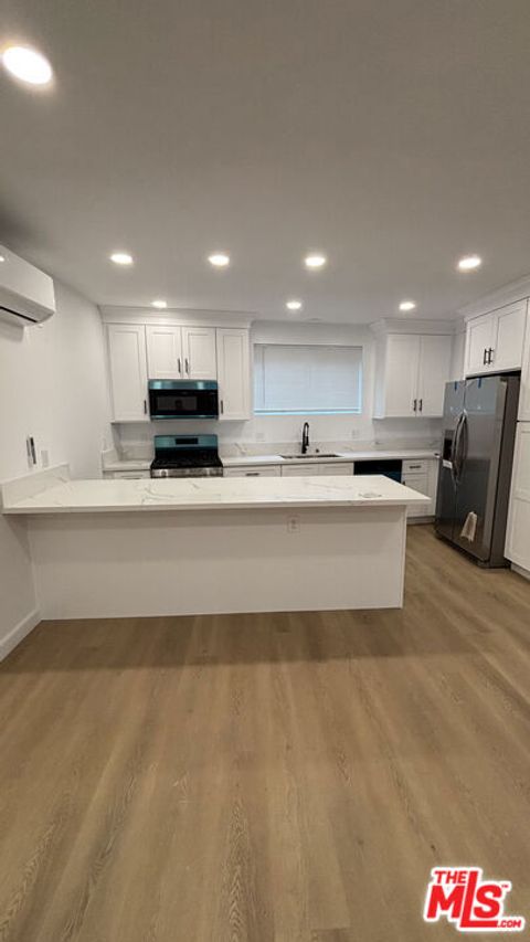 Photo of 2280 S Barrington Avenue #Apt 10, Los Angeles, CA 90064 (MLS # 26657939)