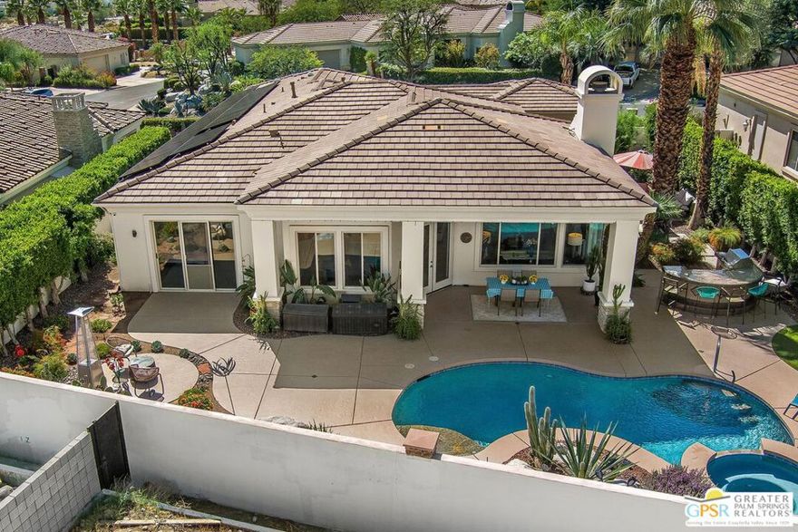 Within the highly desired neighborhood of Historic Tennis Club, you will find the unique gated community of Canyons at Belardo, a cozy enclave of 32 homes in the heart of Palm Springs. This  stunning four-bedroom, four-and-a-half-bathroom home offers the perfect blend of luxury and desert charm. With 2,650 square feet of thoughtfully designed living space, this property showcases breathtaking mountain views that serve as your daily backdrop. This home features high ceilings and lots of light throughout the open great room with a chef's kitchen complete with newly updated custom cabinetry, countertops,  backsplash, and Wolf and KitchenAid appliances. The location offers the rare combination of peaceful residential living with convenient walkability to downtown Palm Springs. You'll find yourself just minutes away from the vibrant dining, shopping, and entertainment and all that downtown has to offer. The main home's 3 bedrooms are all ensuite.  One of the property's most appealing features is the detached casita, perfect for guests, a home office, or creative studio space. The 30-panel owned solar system ensures energy efficiency while reducing utility costs. Outside you'll find a sparkling recently re-done pool and spa, cozy fire pit, and outdoor kitchen all ready for poolside entertaining or just relaxing at home. The expansive mountain views create an ever-changing canvas throughout the day, from sunrise pastels to dramatic sunset silhouettes. This home represents more than just a place to live; it's your gateway to the coveted Palm Springs lifestyle in a secure, well-positioned neighborhood that offers both tranquility and accessibility.