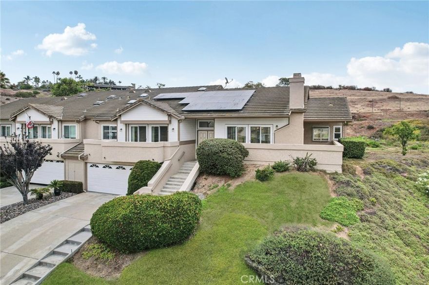 Serene living in the gated neighborhood of Terrace Downs! Panoramic views overlooking the San Luis Rey Equestrian training center from almost every room. 3 bedrooms and 2 bathrooms over 2,270 square feet in one of the most private locations available. Terrace Downs is a gated neighborhood that features two separate pools and a large sitting area overlooking one of the pools and the San Luis Rey equestrian facility. The primary suite is exquisite and the primary bathroom has been updated with designer finishes. The home also features a central vacuum, new carpet, oversized two car garage, and fully electric (no gas service) including paid off solar panels! Spacious rooms, open floorplan, endless views, and lots of natural light are just a few reasons this is a rare opportunity to own a Terrace Downs home with equestrian views!