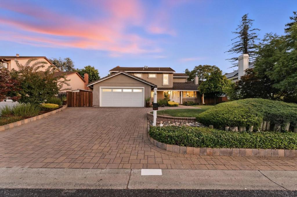Welcome to 112 Bacigalupi Dr, Los Gatos, CA 95032. This beautifully designed two-story home in the Belwood Neighborhood offers 2,460 square feet of refined living space. The master suite impresses with vaulted ceilings, exposed beams, a cozy fireplace, a spacious walk-in closet, and a luxurious bath featuring a soaking tub and separate tiled shower. Gleaming hardwood floors enhance the dining areas, family room, and kitchen. Outside, the landscaped backyard provides a covered patio, bar nook, detached office with a/c and heating, play area, built-in gas bbq, and ample storage. Nestled in a quiet, sought-after area, its close to hiking trails, Belgatos Park, Noddin Elementary, Leigh High school and Belwood Cabana Club.