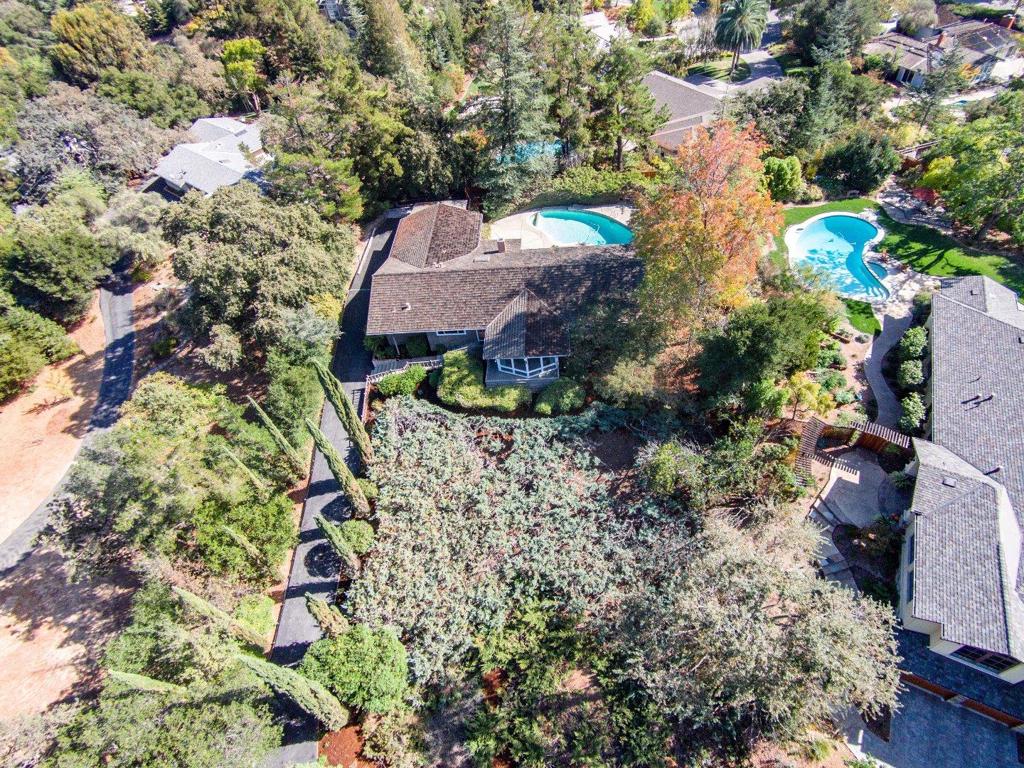 WOW! HERE IT IS! LUXURIOUS SARATOGA ESTATE LIVING AT ITS FINEST! MOVE IN & ENJOY THIS CUSTOM BUILT JIM DAY HOME LOCATED IN ONE OF SARATOGA'S MOST EXCLUSIVE NEIGHBORHOODS W-AWARD WINNING SARATOGA SCHOOLS! FIRST TIME ON MARKET! ENJOY THIS FABULOUS HOME W-UPGRADES GALORE OR FANCY YOURSELF BY BUILDING YOUR OWN CUSTOM LUXURY ESTATE! MORE THAN 1/2 ACRE! MILLION DOLLAR VIEWS ALL AROUND! ENJOY THE BREATHTAKING VIEWS THRU THE WALLS OF GLASS IN YOUR FABULOUS VAULTED CEILING LIVING ROOM! THE OPPORTUNITIES ARE ENDLESS!