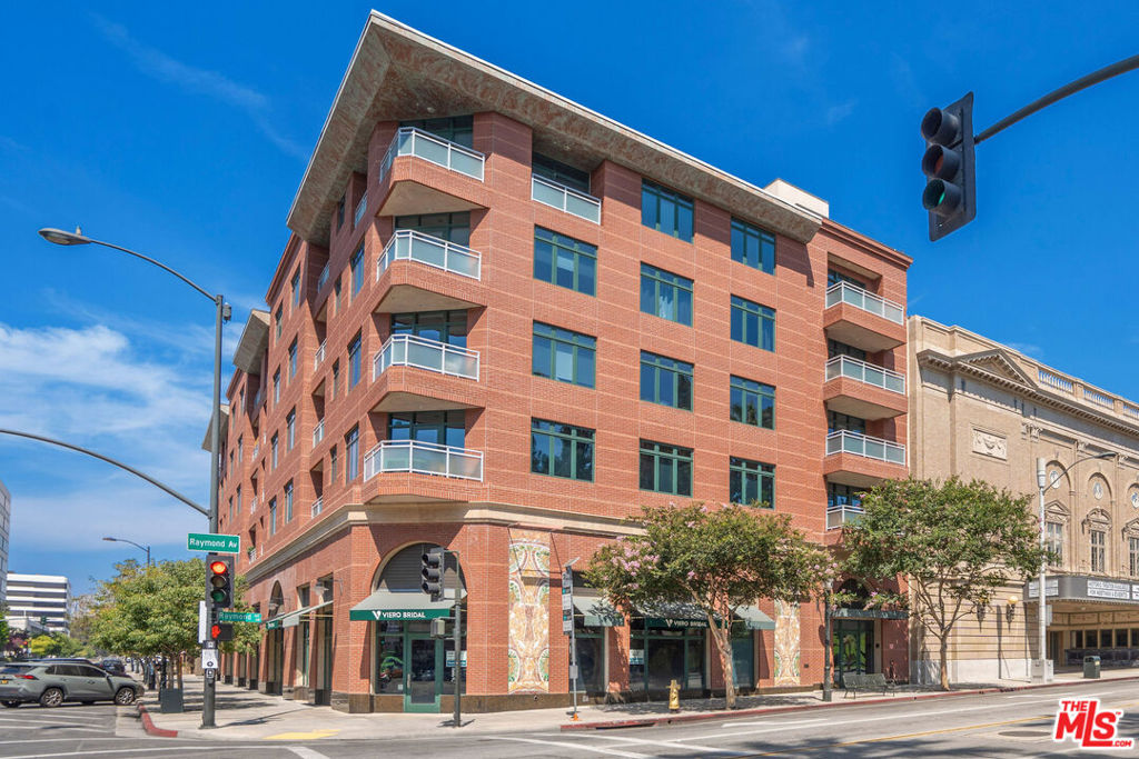 PRIME OLD TOWN PASADENA LOFT-STYLE CONDO! This stunning 2BD/2BA modern unit built in 2009 offers sophisticated industrial design with soaring two-story ceilings and spacious open floor plan. Top floor location ensures maximum privacy. Burnt emerald stained concrete flooring throughout creates cohesive modern aesthetic. UNBEATABLE LOCATION: Walkscore 98/100 One block to Metro Gold Line Station for direct downtown LA access. Two blocks to Colorado Blvd dining, shopping & nightlife. Across from Memorial Park. Steps to Sunday Farmers Market. PREMIUM FEATURES: Granite countertops, tile backsplash, stainless steel appliances, formal dining area, expansive living room, private outdoor patio/balcony. Upper level features two bedrooms - one currently open loft concept ideal for den/office/workspace. LIVE/WORK ZONED property perfect for professionals and entrepreneurs. Move-in ready with washer/dryer/refrigerator included, Nest smart thermostat, two secured parking spots with gated entry. Building amenities include fitness center and hot tub. One of the largest units in Old Town vicinity. Enjoy Old Town Pasadena urban life within minutes to fine dining, cafes, shopping, parks, and entertainment! Easy freeway access. Don't miss this rare opportunity to own in Old Town Pasadena!