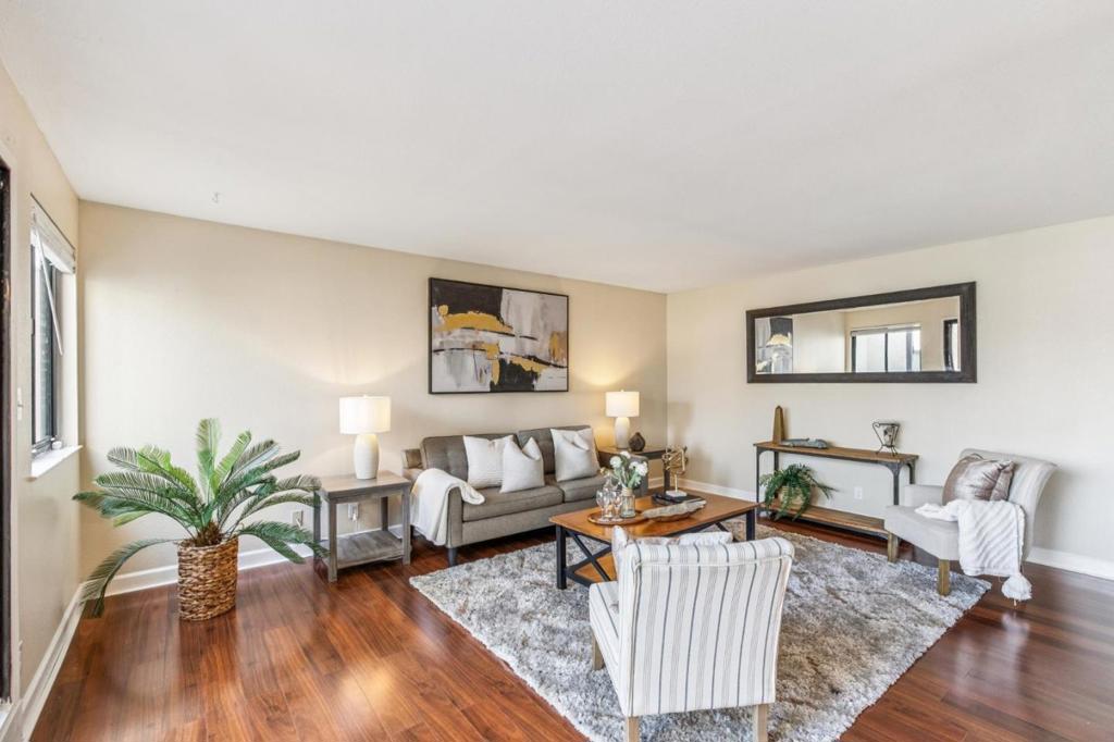 Welcome to 1 Appian Way #705-1, a spacious 3-bedroom, 2-bath Colina condo offering comfort, convenience, and resort-style amenities in the heart of South San Francisco. Enter through your gated patio, creating a serene and private outdoor space perfect for morning coffee or evening relaxation. Inside, the kitchen features granite countertops, ample pantry storage, a breakfast bar, and an in-unit washer/dryer nook-all overlooking a separate dining area. The inviting living room, with sliding doors to the patio, fills with natural light and provides an ideal flow for entertaining. All three bedrooms include mirrored closet doors, adding to the sense of openness. The spacious primary suite boasts a split bath with a stall shower and a large, well-lit vanity. The Colina community offers resort-style amenities including an indoor pool, hot tub, sauna, clubhouse, fitness center, and playground. With its prime location near Westborough Square, Sellick Park, Monte Verde Elementary, shopping, dining, and public transit, plus easy access to Hwy 280, Hwy 101, SFO, and downtown San Francisco, this home is the perfect blend of convenience and lifestyle.