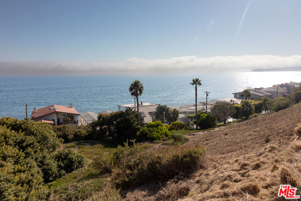 Set behind the gates of prestigious Malibu Cove Colony, this rare land offering combines 24-hour security with sweeping ocean views in one of Malibu's most exclusive enclaves. A unique opportunity to build your dream retreat in a community celebrated for privacy, luxury, and coastal tranquility. The adjacent lot is also available, creating the possibility of owning two contiguous parcels in this coveted seaside colony.