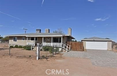 This quiet, spacious, low-maintenance home has 3 bedrooms and 2 bathrooms. This home is newly remodeled and very well maintained. Features include hardwood floors throughout the living room, hallway, and bedrooms. ALL Bedrooms have plentiful space, closets, ceiling fans, and windows bringing in the beautiful natural light. Bathrooms have water-resistant vinyl flooring and beautiful vanities with contrasting fixtures accenting a modern look. The kitchen comes with lots of cabinet space, granite countertops, a chandelier light fixture, and quick access to the laundry area. The front exterior of the home includes a large porch for families to embrace the tranquillity, beautifully lit skies, and fresh breeze during the long summer nights. The backyard is very large and includes a large shaded patio and bench (perfect for BBQ'ing). Do NOT miss out on the opportunity to rent this home! Will not last long. PET & LIVESTOCK FRIENDLY