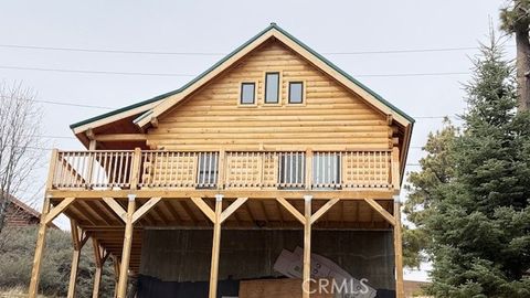 Photo of 33149 Holcomb Creek Drive, Green Valley Lake, CA 92341 (MLS # IV26030683)