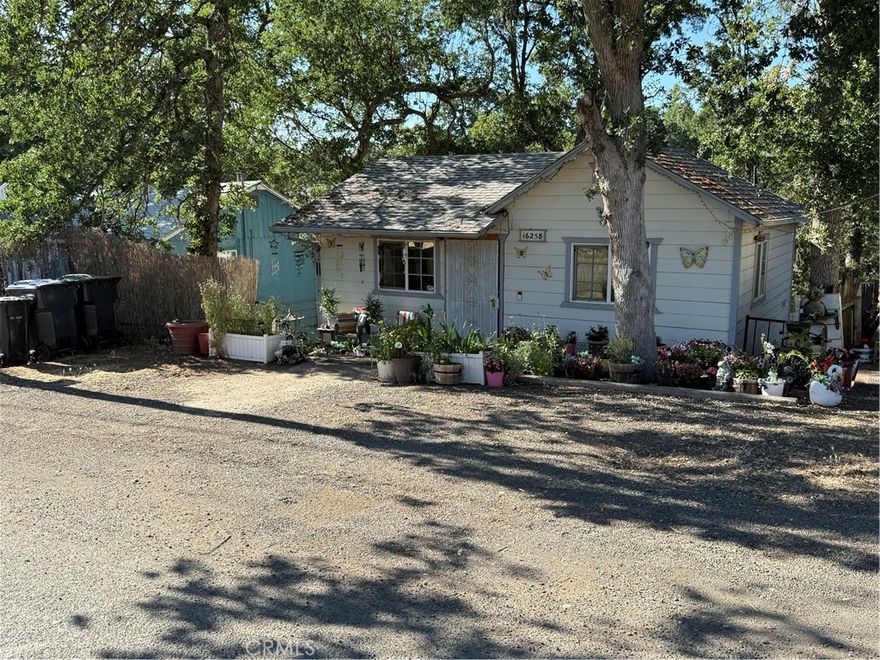 Welcome to this charming 1 bedroom, 1 bathroom home located in the serene landscape of Clearlake, California. Set on a generous lot, this property features a spacious backyard with mature trees. Upon entering the home, you are greeted by a functional kitchen, featuring modern cabinets that cleverly blend style and utility. The bedroom offers comfort and tranquility, designed to accommodate restful nights and rejuvenating mornings.

Additionally, this property showcases beautifully landscaped outdoor area, and storage shed.