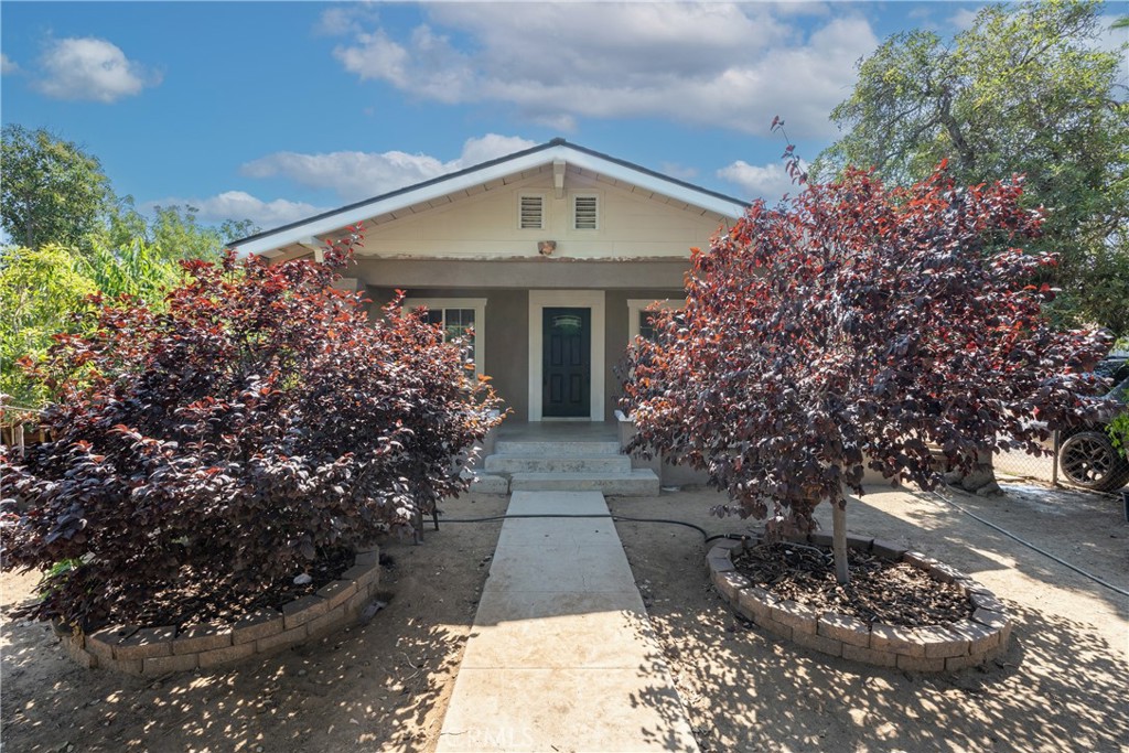 Wow! This is a must see and must have home in a lovely neighborhood of Riverside. This home features 3 bedrooms, 2 bathrooms, 924 living saft and 8,276 sqft lot. This home features a remodeled kitchen, Quartz counter tops, kitchen is open to the living room with chimney, laminate flooring throughout the home, new exterior paint, dual paned windows, recessed lighting, and a detached 2 car garage. The Backyard features back patio, garden beds, storage shed, and side gate access. Perfect for parties with family and friends to gather and enjoy. The location of this home is great just minutes away from the 91 freeway.