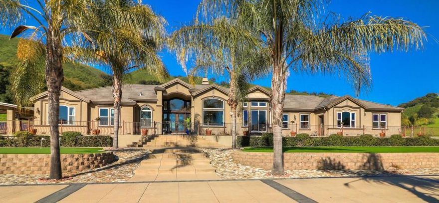 TWO CUSTOM BUILT HOMES on 40+ acres in the heart of Santa Clara Valley's Wine Country! The main home is 5,600 square feet with 5 beds and 4 baths, and the second home is 1,400 square feet with 3 beds and 2 baths. The two homes, situated privately on the property, offer a unique opportunity for two families or a rental income. Exquisite design and style in the main home, featuring built in African mahogany cabinetry, elegant lighting fixtures, single story open floor plan with 14 foot vaulted ceilings. Premium Chef's Kitchen with granite countertops, high-end Viking stainless steel appliances, center island with sink and 2 double ovens, full size Viking wine fridge, and oversized walk-in pantry. Surrounded by mountains and Gilroy's lush valley, the sprawling property features a pool & spa with spacious deck and gazebo, tennis court, basketball court, and hiking/biking trails! Plenty of parking for guests, plus a total garage space for 10 cars!
