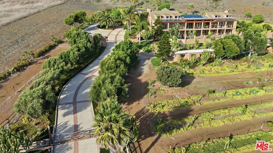 Indulge in the ultimate getaway at a luxurious, all-solar guest home showcasing breathtaking ocean vistas. This eco-friendly property features a solar-heated lap pool, with all utilities included for added convenience. Situated in close proximity to Leo Carrillo Beach, guests can enjoy seamless accessto world-class surfing, as well as nearby gardening, hiking, and beach trails. Nestled amidst 25 acres of lush landscaping adorned with lemon trees, this serene haven offers a perfect blend of sustainability and natural beauty. An outdoor patio with BBQ area adds to the property's allure, Located near County line, it provides an ideal escape for nature lovers and outdoors enthusiast alike.