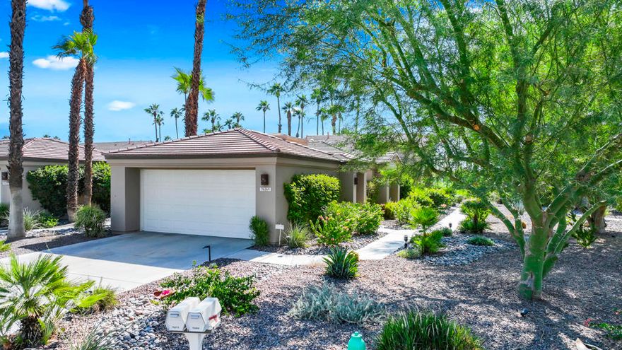 Beautiful Lakefront Luxury Condo Completely Remodeled with Golf and Tennis Membership!This is the getaway you have been dreaming of in the desert!  This stunning Lakefront condo is gorgeous and now available for the first time as a SHORT TERM RENTAL!  This 3 BR, 3BA condo has been  reconfigured making this a one-of-a kind Sycamore model on one of the best view lots in Palm Valley CC.  As you step through the custom glass entry door you immediately notice the breathtaking lake view, lush golf course and majestic mountains that extend gracefully through the windows and sliders creating an indoor-outdoor ambience for entertaining, then you look at the home and discover the entire home has been professionally and tastefully decorated!  This floor plan has soaring ceilings that seamlessly connect to the dining area and a 12 ft. granite wet bar w/ wine cooler where friends & family will enjoy gathering.  This beautifully upgraded condo offers boundless enhancements including motorized interior blinds, 2 car garage w/ epoxy floor, stacked stone fireplace w/ flat screen TVs, a built-in BBQ, wall insets to showcase the beautiful artwork and every room has been recently painted making it light and bright.  The kitchen is a dream for the cook in the family and boasts a unique semi-circle granite kitchen island w/ seating for 5, under counter microwave, stainless Frigidaire appliances and a chic stainless steel and glass hood.  All the bathroom ensuites have raised granite counter tops, Toto toilets, custom sinks and faucets, custom designed showers. The Primary ensuite showcases a recessed wall mounted 55'' television, 2 walk-in closets dual sinks w/granite counter tops, custom designed shower, and a private bedroom patio. One of the guest bedrooms is currently used as a den w/ a custom entertainment wall that houses a recessed 65'' television, built-in desk, stacked stone wall from floor to ceiling, & custom wall cut-outs which provide a flow through feel.  Palm Valley CC is conveniently situated just minutes away from various shopping destinations, including El Paseo, The River, Casinos, Living Desert Reserve and so much more!   There is a vast array of dining options in the desert and numerous grocery stores are also nearby, such as Whole Foods, Bristol Farms as well as Costco.  This is the lifestyle we love here in the desert so come be a part of it and experience the 5 Star resort lifestyle of Palm Valley CC, one of the desert's most vibrant communities!