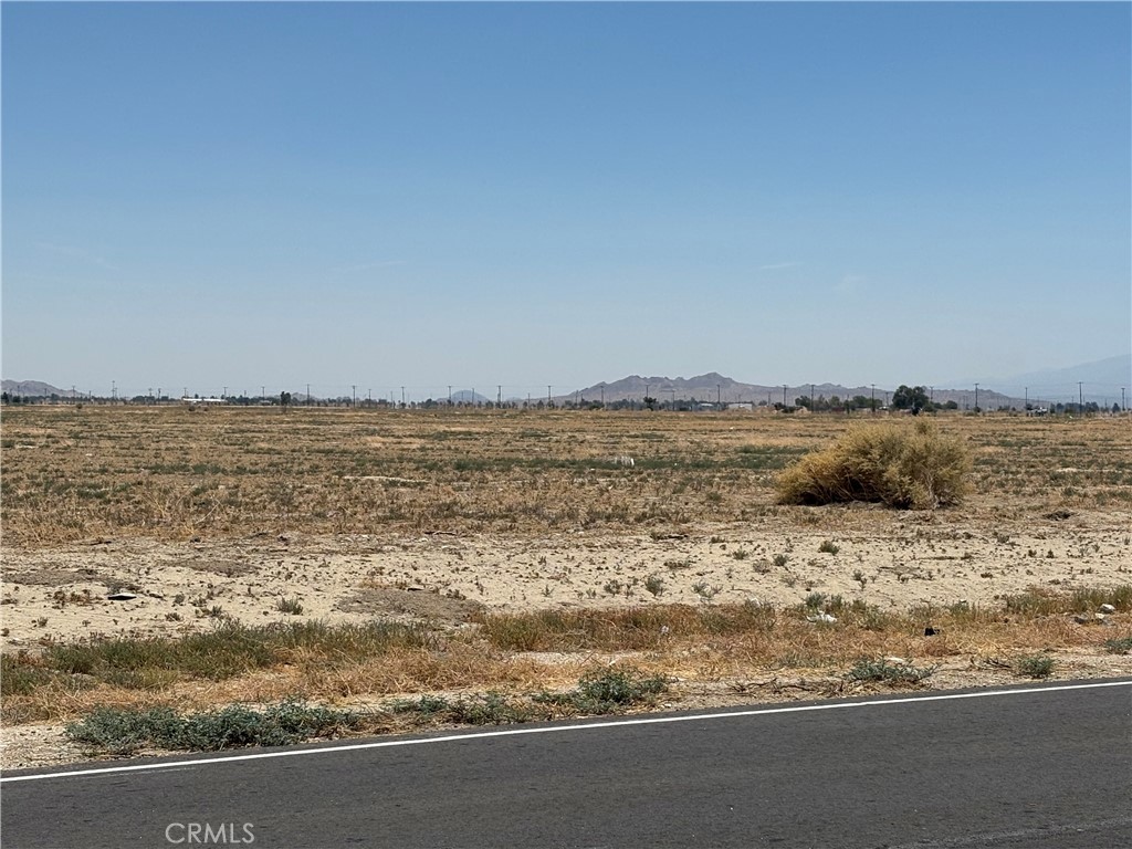 Land parcel in East Lancaster. Situated on nicely paved road - 60th St E. There are power lines running just across the street from this property. This would be a perfect location for a small ranch, or a mobile home.