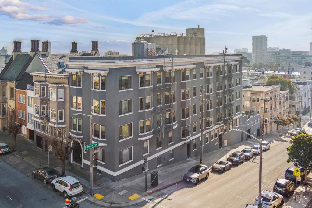 The best of San Francisco unfolds in tints of misty blue just outside the door of this 18-unit apartment building that is yours to claim as the crown jewel of your investment portfolio. Standing tall on a corner lot in Lower Pacific Heights, the building is just one block from the delights of Lafayette Park: tennis courts, a playground, a dog play area, and walking trails. Beyond, the gentle waves of San Francisco Bay glide through East Harbor and lap softly against the sides of Pier 2 and the verdant grounds of a Golden Gate National Recreation Area. Your lucky tenants can gather with friends around the fire pit on the grassy rooftop patio, gazing out at the pulsating city life around them. People travel from all over the world to visit destinations like Lombard Street and Pier 39. Here is a property that places its residents in the center of it all, walking distance from every form of cultural enrichment and artistic wonderment. Bear witness to architectural marvels of the 20th century, recalling all of the legendary people who have lived, worked, dreamed, and made their mark in this inimitable city. Now it is your turn. Each unit has been well maintained, and all city-required seismic retrofitting has been done. Financials are available upon request. Time to make your move.