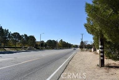 Photo of 1239 Ave O8, Palmdale, CA 93551 (MLS # SR26109493)