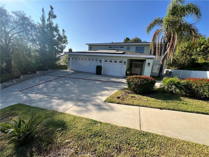 4 bedrooms, plus a bonus room, 3 bathrooms, 3044 sq. ft. home on a large 11,479 sq. ft. Lot with sweeping Diamond Bar Valley views. The home offers a formal living room, height ceilings, recess lighting, shutters, fireplace, surround sound system, and enlarged windows providing plenty of natural light. Family room with a wet bar, and French doors that gives a bright and airy feeling while facing the backyard. Separate dining room, breakfast area, and a bonus room. Kitchen offers oversized granite countertops, custom cabinets, and plenty of ceiling lights. Upstairs includes the master bedroom with private bath, and a balcony to enjoy the bright sunsets!  Additionally, upgrades provide 17 solar panels, full PEX repipe and a new central A/C. Replaced roofing and a new water heater. A spacious 3 car attached garage, laundry area with additional RV Parking. Also enjoy the convenience of the Diamond Point Club, which offers many amenities, such as tennis counts, barbecue area, 2 swimming pools all year long.  This home is conveniently located near the 57 & 60 freeways and a walkable distance to Diamond Point Elementary School.