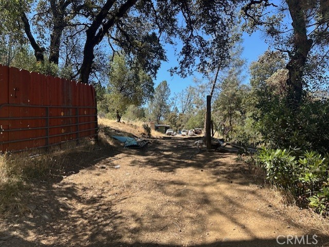 Great opportunity to acquire a nice parcel in the lower foothills of Oroville. This parcel four + acres just off Black Bart Rd. with paved frontage and well and septic. Power is available & in close proximity. Great place to build your dream home or for a new manufactured home. Nice setting and close to many recreational opportunities in the area. Call you realtor today to view this property!