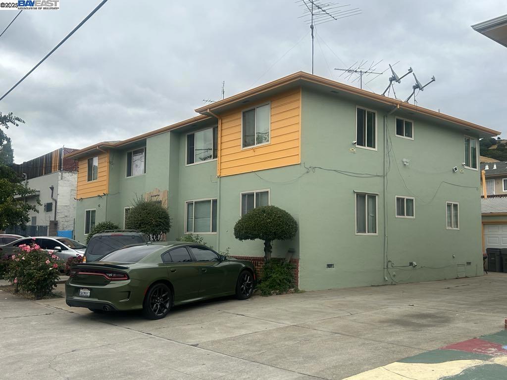 **Please do not disturb the tenants** Nestled at the gateway to Oakland’s desirable Sheffield Village neighborhood, this 4-unit property presents an exceptional investment opportunity. The property features an excellent unit mix—one 3-bedroom, two 2-bedroom, and one 1-bedroom units. The detached garage offers potential for an ADU conversion, unlocking additional income possibilities. Strategically located right next to Interstate 580, it ensures seamless connectivity for residents. Perfect for investors seeking a value-add project or house hackers looking to live in one unit while leasing the rest, this property combines modern potential with the charm of a vibrant, well-connected community.