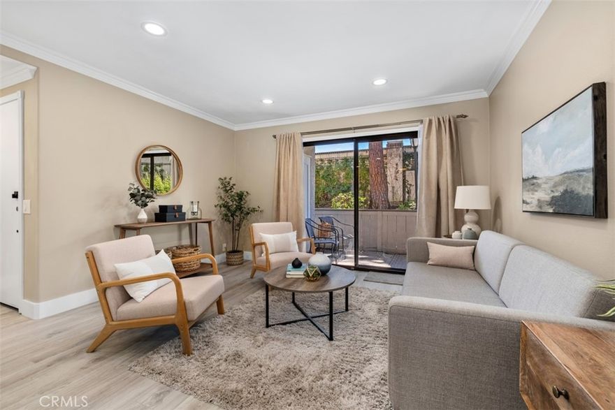 Welcome to this convenient community with resort-style amenities in the city of Laguna Niguel. Discover comfortable living in this cozy 2 bed/1 bath single-level condo nestled in the sought after Casa La Paz community. This gated community offers the perfect blend of privacy, convenience, and a recreational lifestyle. Step inside to find plenty of natural light and an open-concept layout where living areas flow seamlessly. The updated kitchen features maple cabinetry, granite countertops, and stainless steel appliances. Updated crown molding and modern baseboards add beautiful touches throughout. This property includes one carport with additional storage and one parking space. There is plenty of guest parking as well. In-unit washer and dryer, well appointed bedroom closets with updated built-ins. Residents enjoy exclusive access to amenities including a sparkling pool, spa, tennis courts, and a dog park. This gated community setting provides both security and comfort, and is steps from shopping, dining and entertainment. Experience California coastal living and the Casa La Paz lifestyle for yourself.