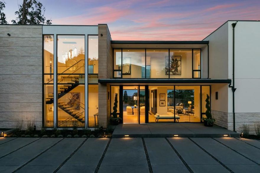 The embodiment of modern luxury at its finest. This stunning new construction has an emphasis on sleekness, ENDLESS views and clean lines throughout. 6 bedrooms,8 full bathrooms 2 half bathrooms, 6 car garage parking, situated on 1.25 acres of manicured grounds, a seamless transition from indoor to outdoor living w/ retractable glass doors & views of the Bay on all floors. A pristine infinity pool you can view from all areas of the expansive decks & outdoor fireplace perfect for lounging. Spacious interior boasts an open floor plan showcasing a gourmet  kitchen w/ luxurious custom finishes. The lower level is ideal for entertaining and highlights a game room, home theater, gym w/steam & sauna & impressive in-law suite with bedroom, bathroom and full kitchen, along with your own separate entrance. A blend of unsurpassed energy-efficient technology & sustainable building materials brings comfort & design to a new level.  A true modern masterpiece in home building innovation awaits you!