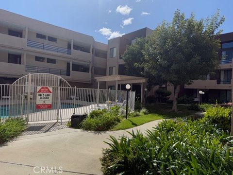 Photo of 7826 TOPANGA #213, Canoga Park, CA 91304 (MLS # SR25057129)