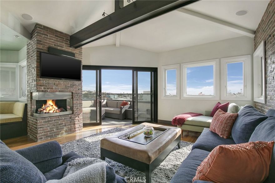 Sophisticated Contemporary Living, in a single family residence, in the Heart of Downtown Manhattan Beach



Experience the pinnacle of coastal luxury in this custom contemporary residence nestled just two blocks from the sand, in the vibrant heart of downtown Manhattan Beach. Boasting approximately 2,000 square feet of refined living space, this beautifully designed 3-bedroom, 3.5-bath home offers a seamless blend of style, comfort, and convenience—perfectly positioned for the ultimate beach lifestyle.



Step inside to discover rich Brazilian walnut hardwood floors, soaring vaulted ceilings, and a sun-drenched living room complete with a cozy fireplace and an ocean-view balcony ideal for al fresco dining with a built-in BBQ. The open-concept chef’s kitchen is an entertainer’s dream, featuring sleek Caesarstone countertops, premium stainless steel appliances, and contemporary custom cabinetry.



Retreat to the oversized primary suite, a true sanctuary with its own private balcony, generous walk-in closet, and a spa-inspired ensuite bathroom designed for indulgence. Each of the two additional bedrooms offers its own private bath, providing comfort and privacy for family and guests alike.



With coveted 3-car parking, this exceptional home places you steps from award-winning restaurants, charming boutiques, the iconic Manhattan Beach Pier, and the area's beloved Farmers Market. Whether you’re sunbathing on LA’s most pristine beach, enjoying a scenic walk along The Strand, or hopping on a quick Uber to LAX just minutes away—this home surrounds you with the best of Southern California living.

The Seller Will Consider Concessions in Offer

Don’t miss this rare opportunity to live and have piece of Manhattan Beach luxury in one of the most walkable and desirable coastal neighborhoods in the world. May do unfurnished for a 2 year term or other improvements to the Lease, call for details.
