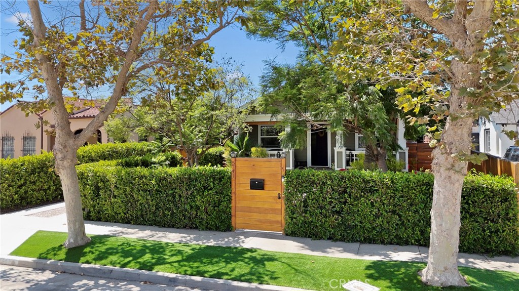 Modern Elegance, Prime Location & Resort-Style Living in the Heart of Los Angeles. Welcome to this rare opportunity to own a private, gated retreat in one of LA’s most dynamic and emerging neighborhoods. Built in 2016, this single-story home features 3 spacious bedrooms and 2 well-appointed bathrooms, with an open layout that offers both comfort and function. Set behind lush privacy shrubs that surround the entire property, the front yard doubles as a private outdoor lounge, perfect for relaxing or entertaining. A long gated driveway with automatic opener provides secure, off-street parking and leads to a spacious backyard with additional storage sheds and ample potential for an ADU or guest house. Inside, the home is filled with natural light and offers a seamless flow between living, dining, and kitchen areas. You’ll also enjoy modern systems throughout, including a newer electrical panel, central air conditioning, providing peace of mind and low-maintenance living. Located just minutes from the heart of Inglewood, you’re in close proximity to LA’s most exciting destinations SoFi Stadium, Kia Forum, Hollywood Park Casino, and the future Intuit Dome, home of the LA Clippers. Easy access to the 110 and 105 freeways makes commuting throughout the city a breeze. Whether you're looking for a move-in-ready residence or a property with future development potential, this property offers flexibility, value, and an unbeatable location. This is more than a home it's a lifestyle opportunity in one of LA’s most rapidly appreciating markets.