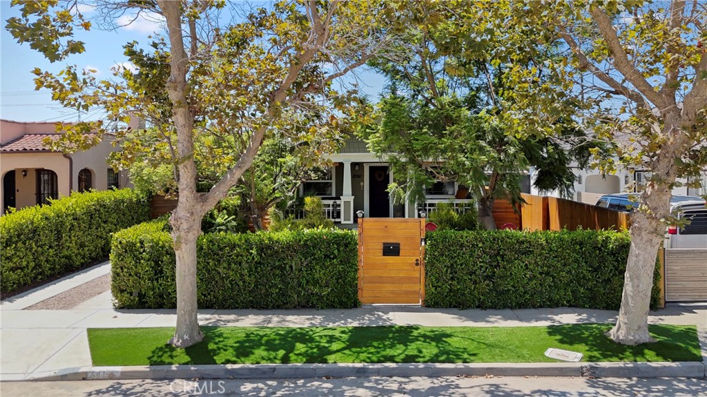 Modern Elegance, Prime Location & Resort-Style Living in the Heart of Los Angeles. Welcome to this rare opportunity to own a private, gated retreat in one of LA’s most dynamic and emerging neighborhoods. Built in 2016, this single-story home features 3 spacious bedrooms and 2 well-appointed bathrooms, with an open layout that offers both comfort and function. Set behind lush privacy shrubs that surround the entire property, the front yard doubles as a private outdoor lounge, perfect for relaxing or entertaining. A long gated driveway with automatic opener provides secure, off-street parking and leads to a spacious backyard with additional storage sheds and ample potential for an ADU or guest house. Inside, the home is filled with natural light and offers a seamless flow between living, dining, and kitchen areas. You’ll also enjoy modern systems throughout, including a newer electrical panel, central air conditioning, providing peace of mind and low-maintenance living. Located just minutes from the heart of Inglewood, you’re in close proximity to LA’s most exciting destinations SoFi Stadium, Kia Forum, Hollywood Park Casino, and the future Intuit Dome, home of the LA Clippers. Easy access to the 110 and 105 freeways makes commuting throughout the city a breeze. Whether you're looking for a move-in-ready residence or a property with future development potential, this property offers flexibility, value, and an unbeatable location. This is more than a home it's a lifestyle opportunity in one of LA’s most rapidly appreciating markets.